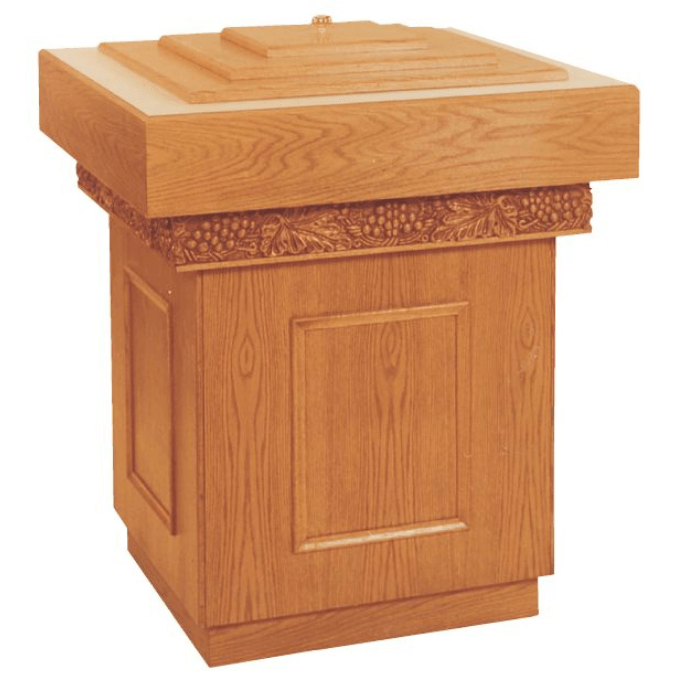 the 550 baptismal font with a stainless steel basin, and flowery trap trim designs around the top