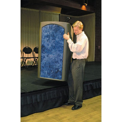 Man lifting lightweight portable podium off of stage