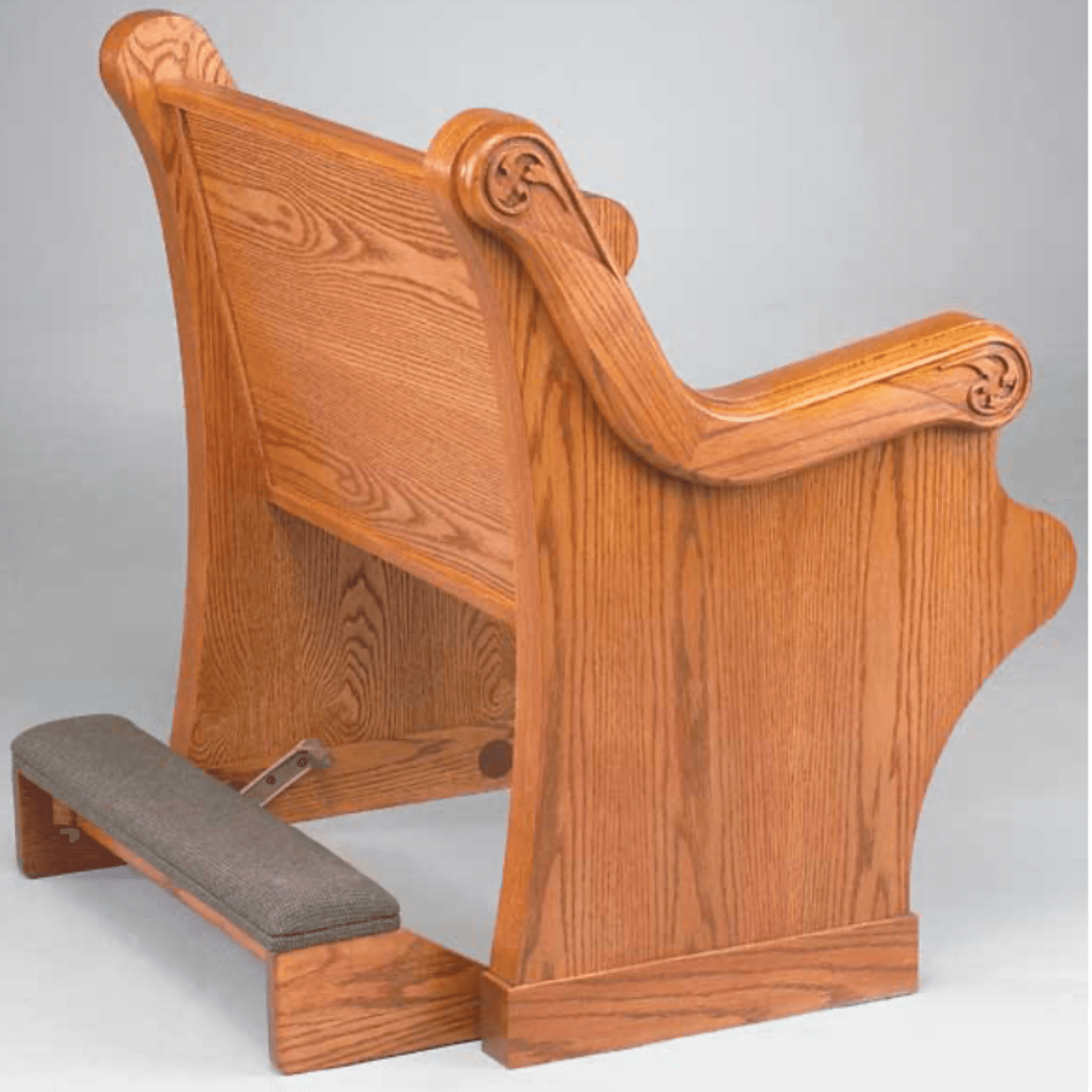 Pew with padded kneeler on the back