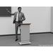 height adjustable podium with person speaking behind it. 