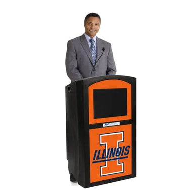 A man standing behind the amplivox S3253 with an Illinois school logo.